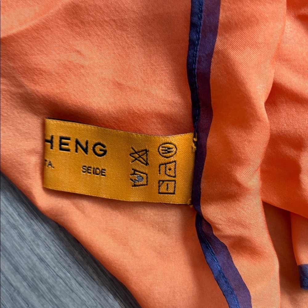 Lola Cheng | 100% Silk Scarf in Orange with Purple Edging - Picture 5 of 6